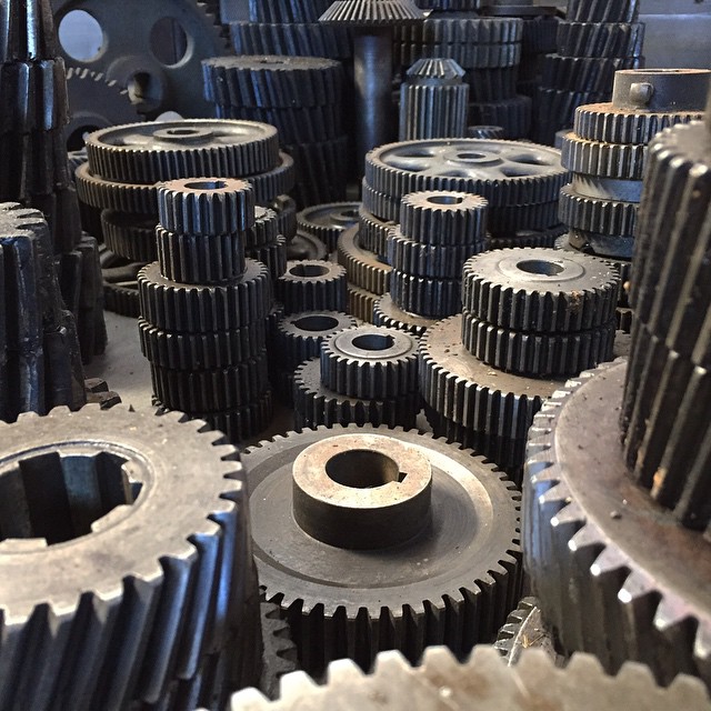 I was gifted an awesome set of old lathe gears today. Seeing them all laid out like this has me thinking of using them for a miniature film set.